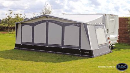 A tent is shown in the grass.