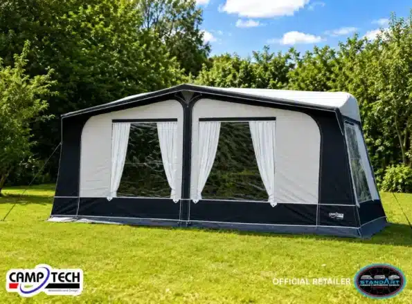 Camptech Cayman full poled touring caravan awning pitched at a campsite